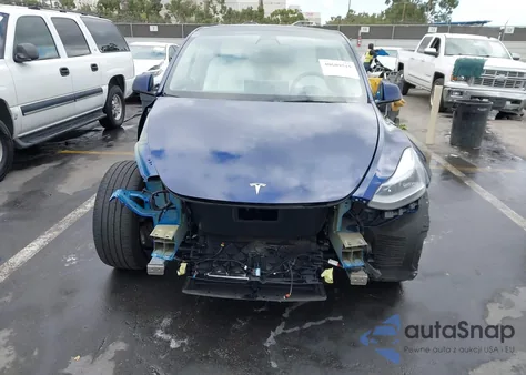 2022 Tesla Model Y Long Range Dual Motor All-Wheel Drive z USA, uszkodzony, nr VIN 7SAYGAEE4NF538480